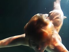 Babes swim and get naked underwater