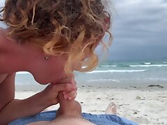 Deep oral pleasure on the beach, female